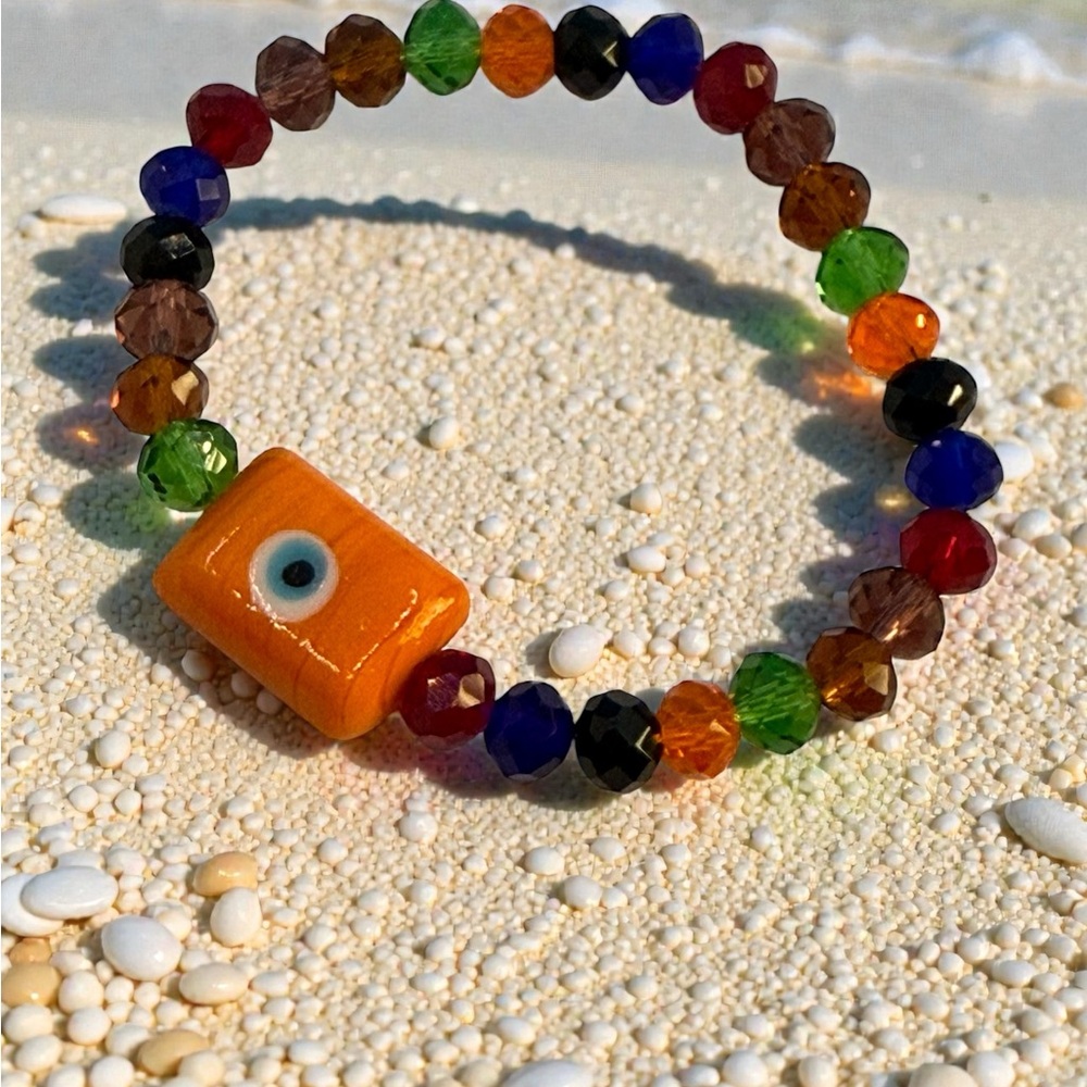 “Fiery Protection: Red Evil Eye Bracelet for Strength & Energy”
